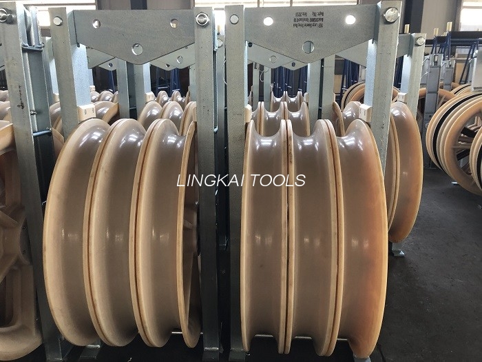 บล็อกร้อยสายตัวนำลูกกลิ้งไนลอนขนาด 660 มม. สำหรับสายเคเบิลที่แถมมาเหนือศีรษะ